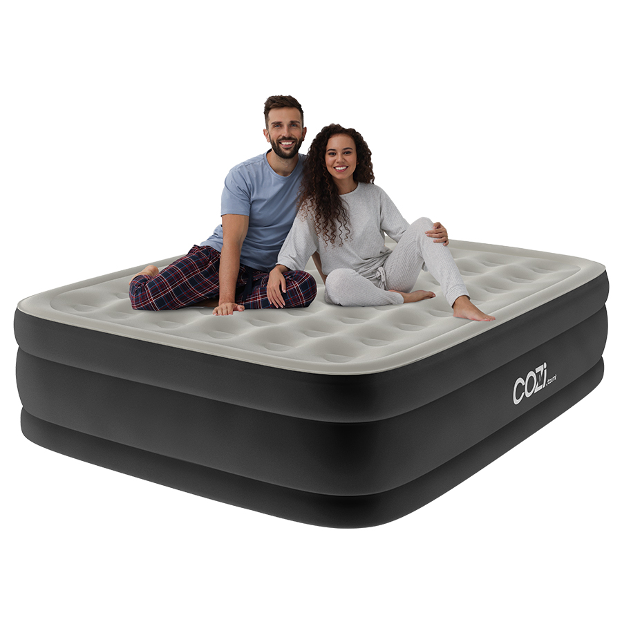Man and woman using Cozi Portable Air Mattress