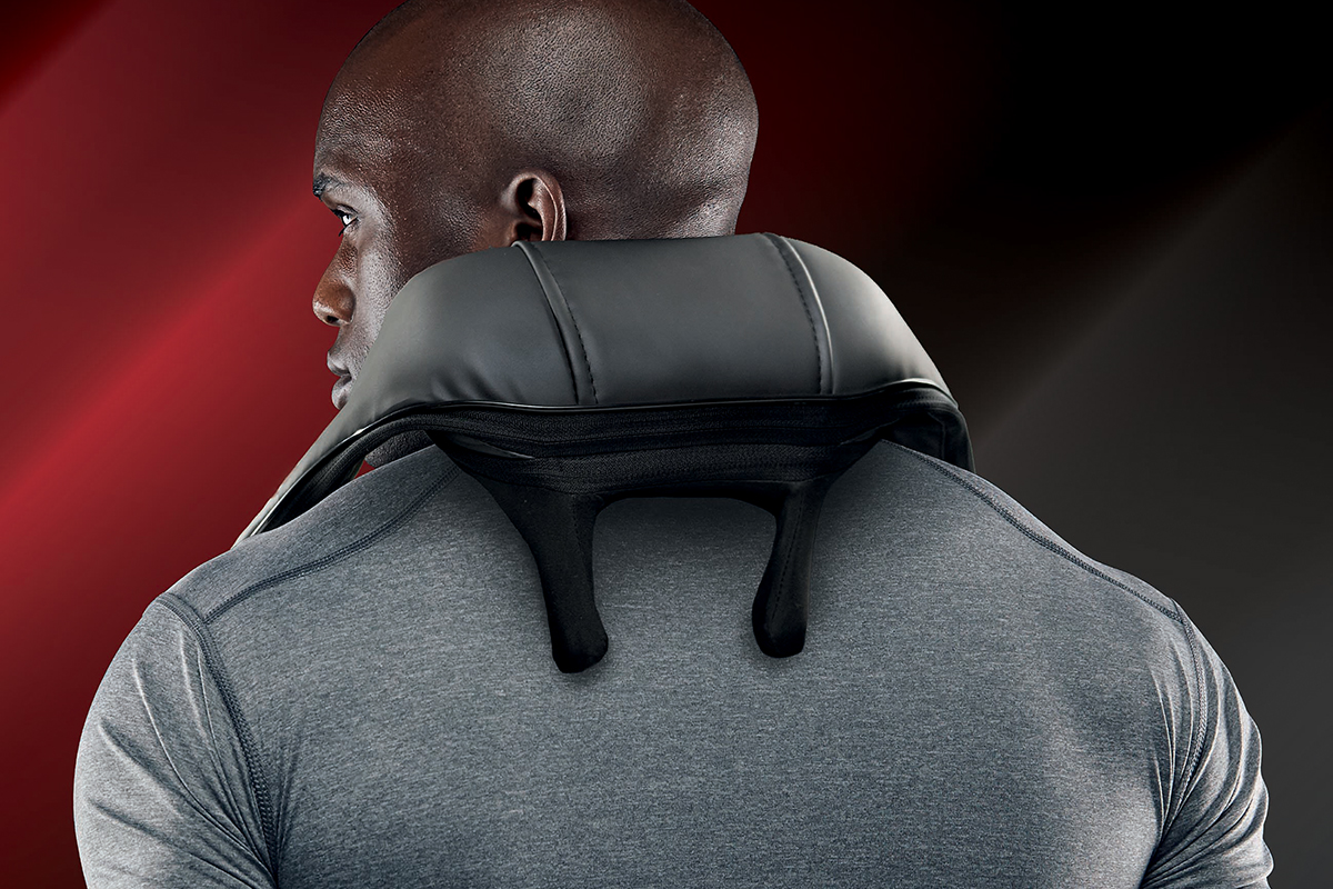 Man using FitRx Shiatsu Pro back and neck massager