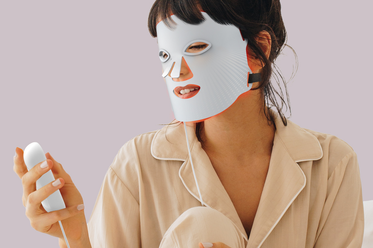 Woman using SLF LED Face Mask