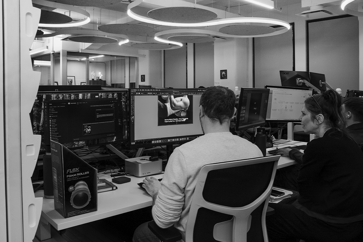 Focused creative team working on digital asset creation at the StudioZ NYC office.